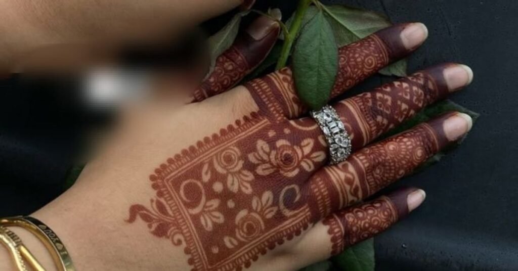 Back hand rose royal mehndi design